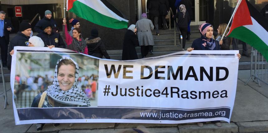 Rally with banner reading "We Demand Justice for Rasmea"