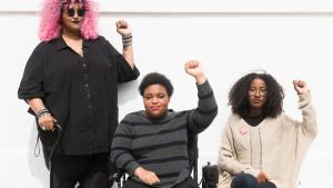 Black queer and trans disabled folks raise fists